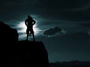 Preview wallpaper silhouette, man, hill, sky, clouds