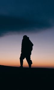 Preview wallpaper silhouette, man, night, freedom, sky, clouds