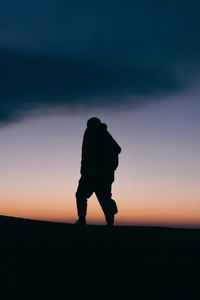 Preview wallpaper silhouette, man, night, freedom, sky, clouds