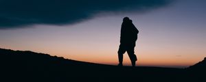 Preview wallpaper silhouette, man, night, freedom, sky, clouds