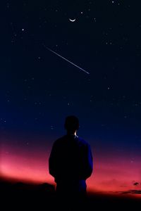 Preview wallpaper silhouette, man, night, stars, starfall