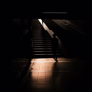 Preview wallpaper silhouette, man, stairs, dark