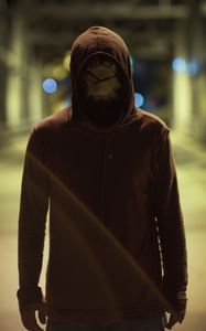 Preview wallpaper silhouette, mask, hood, clock, glare