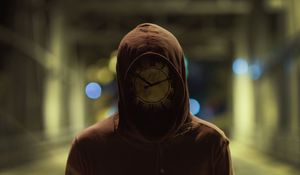 Preview wallpaper silhouette, mask, hood, clock, glare