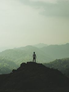 Preview wallpaper silhouette, mountains, fog, peak, loneliness, freedom