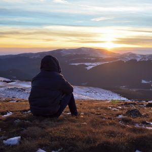 Preview wallpaper silhouette, mountains, sunset, landscape, loneliness