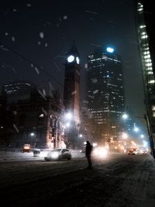 Preview wallpaper silhouette, night city, snowfall, street, city lights