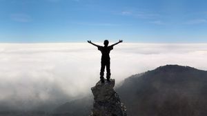 Preview wallpaper silhouette, people, rocks, sky, top