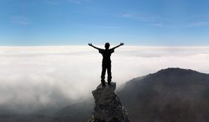 Preview wallpaper silhouette, people, rocks, sky, top