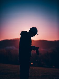 Preview wallpaper silhouette, photographer, dark, sunset, twilight, evening