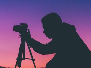 Preview wallpaper silhouette, photographer, person, camera, sunset