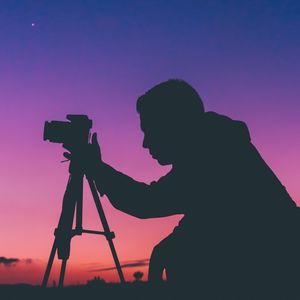 Preview wallpaper silhouette, photographer, person, camera, sunset