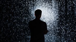 Preview wallpaper silhouette, rain, light, sparks, shine