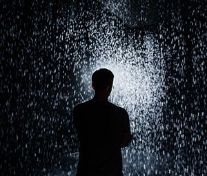 Preview wallpaper silhouette, rain, light, sparks, shine