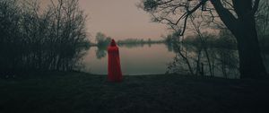 Preview wallpaper silhouette, red, cloak, lake, shore
