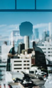 Preview wallpaper silhouette, reflection, window, city, buildings