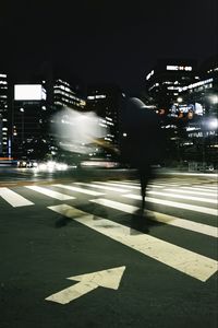 Preview wallpaper silhouette, road, cars, street, dark, blur