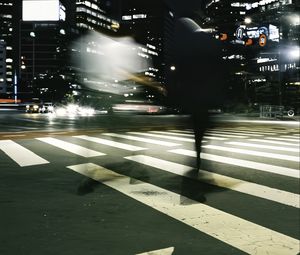 Preview wallpaper silhouette, road, cars, street, dark, blur