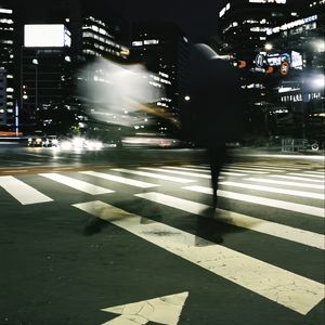 Preview wallpaper silhouette, road, cars, street, dark, blur