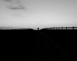 Preview wallpaper silhouette, road, fence, dark