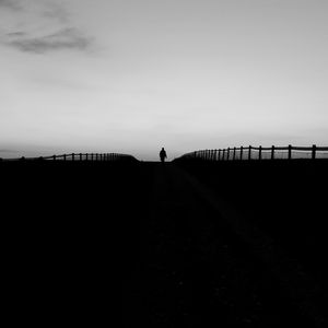 Preview wallpaper silhouette, road, fence, dark