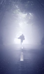 Preview wallpaper silhouette, road, fog, run, alone