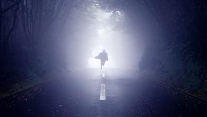 Preview wallpaper silhouette, road, fog, run, alone