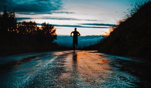 Preview wallpaper silhouette, road, running, asphalt, wet