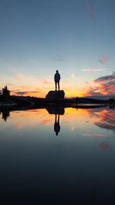 Preview wallpaper silhouette, rock, alone, water, reflection