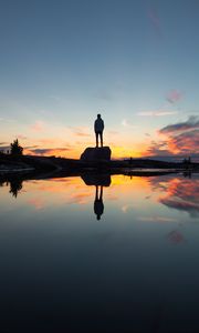 Preview wallpaper silhouette, rock, alone, water, reflection