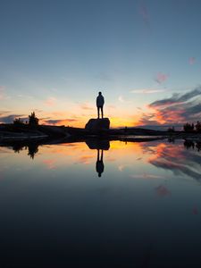 Preview wallpaper silhouette, rock, alone, water, reflection