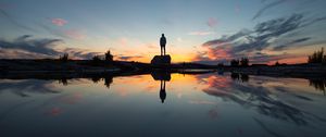 Preview wallpaper silhouette, rock, alone, water, reflection