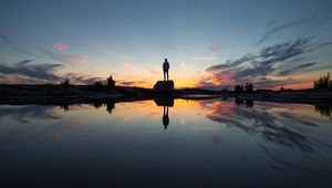 Preview wallpaper silhouette, rock, alone, water, reflection