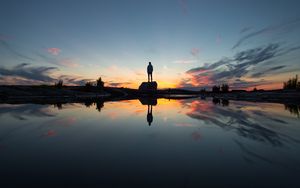 Preview wallpaper silhouette, rock, alone, water, reflection