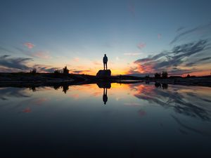 Preview wallpaper silhouette, rock, alone, water, reflection