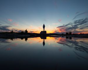 Preview wallpaper silhouette, rock, alone, water, reflection