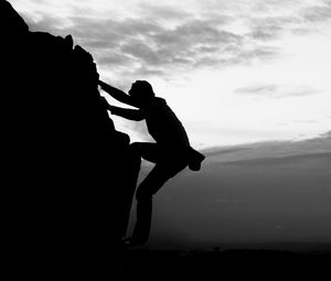 Preview wallpaper silhouette, rock, dark, bw, climber