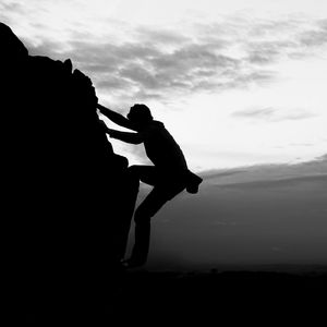 Preview wallpaper silhouette, rock, dark, bw, climber