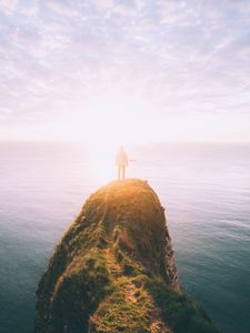 Preview wallpaper silhouette, rock, sunset, sea, sunlight, cliff