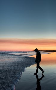 Preview wallpaper silhouette, sea, coast, loneliness, solitude