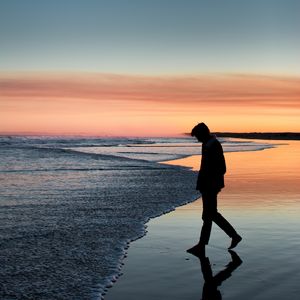 Preview wallpaper silhouette, sea, coast, loneliness, solitude