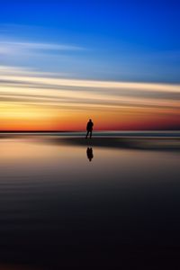 Preview wallpaper silhouette, sea, evening, horizon