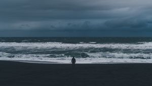 Preview wallpaper silhouette, sea, storm, cloudy, waves, loneliness, lonely