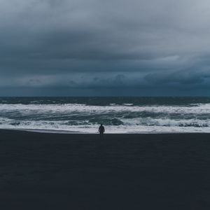 Preview wallpaper silhouette, sea, storm, cloudy, waves, loneliness, lonely