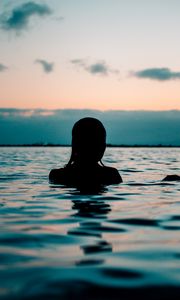 Preview wallpaper silhouette, sea, sunset, swimming, ripples