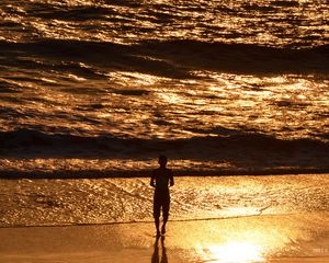 Preview wallpaper silhouette, sea, surf, sunset