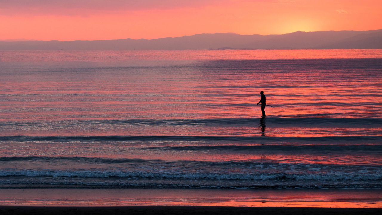 Wallpaper silhouette, sea, waves, sunset