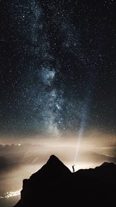 Preview wallpaper silhouette, starry sky, lighting, mountains