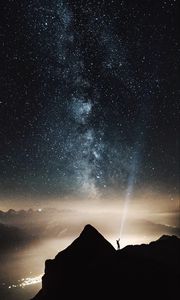 Preview wallpaper silhouette, starry sky, lighting, mountains