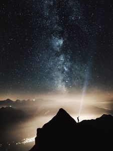 Preview wallpaper silhouette, starry sky, lighting, mountains